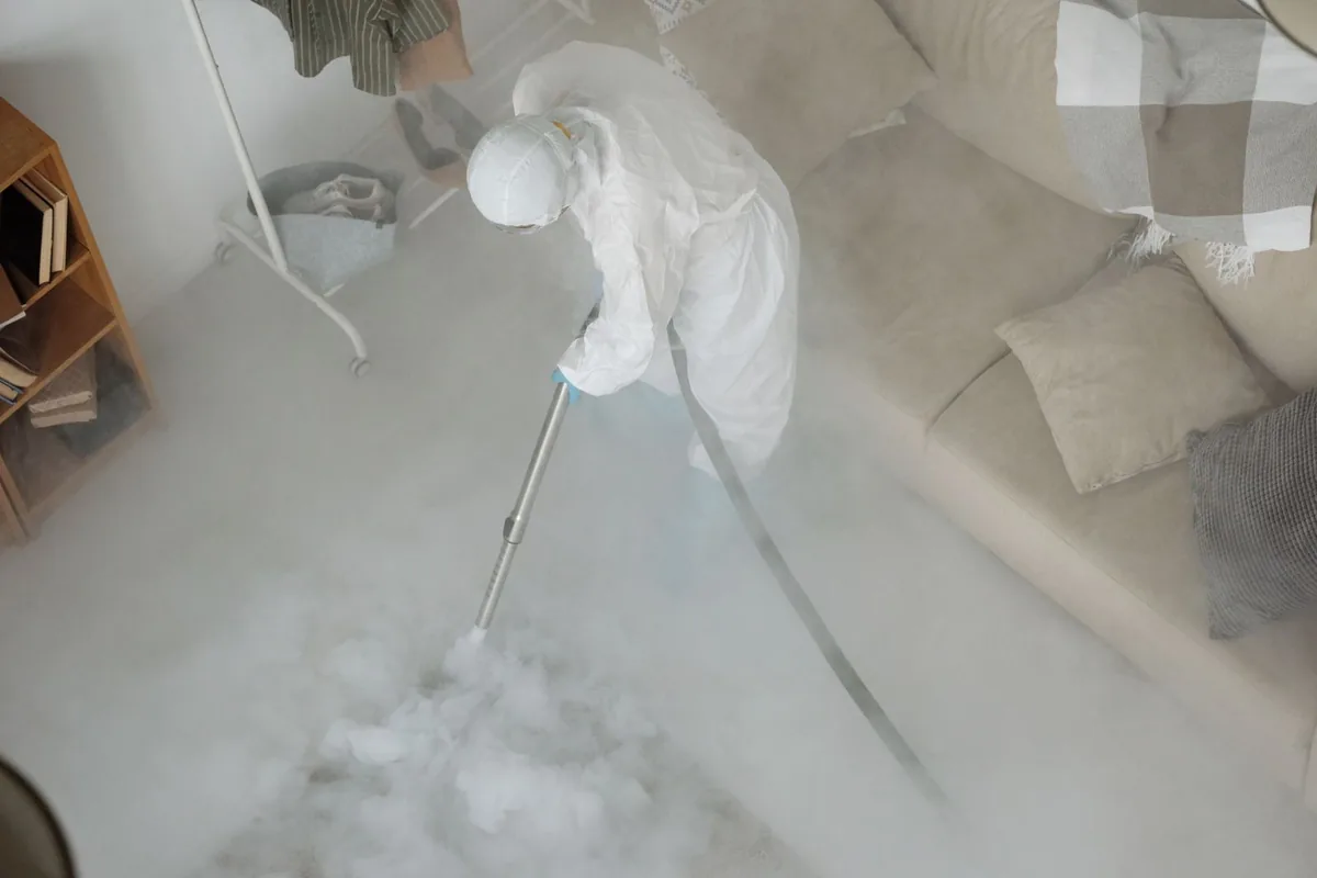 Biohazard cleanup technician in protective equipment, McEwen, TN